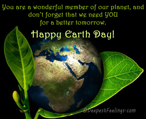 A card showing a globe on the leaf of a tree and greeting of Earth Day